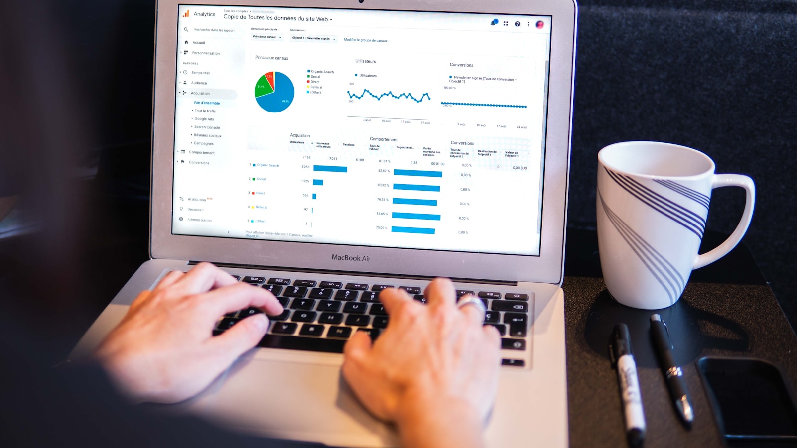 Modern laptop workspace suggesting AI-powered browser workflows